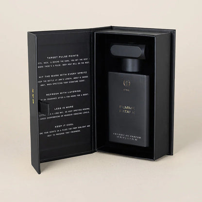 a bottle of perfume in a black box