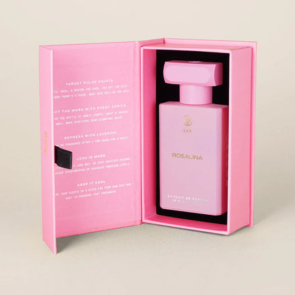 a pink bottle of perfume in a pink box