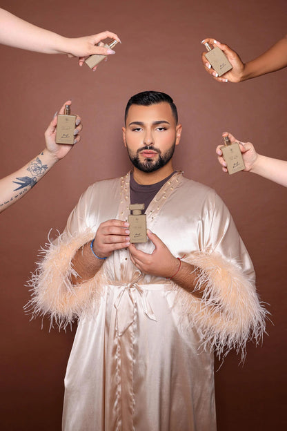 a man standing in front of a group of people holding cell phones