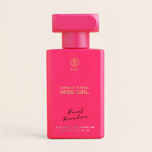a bottle of pink perfume on a white background