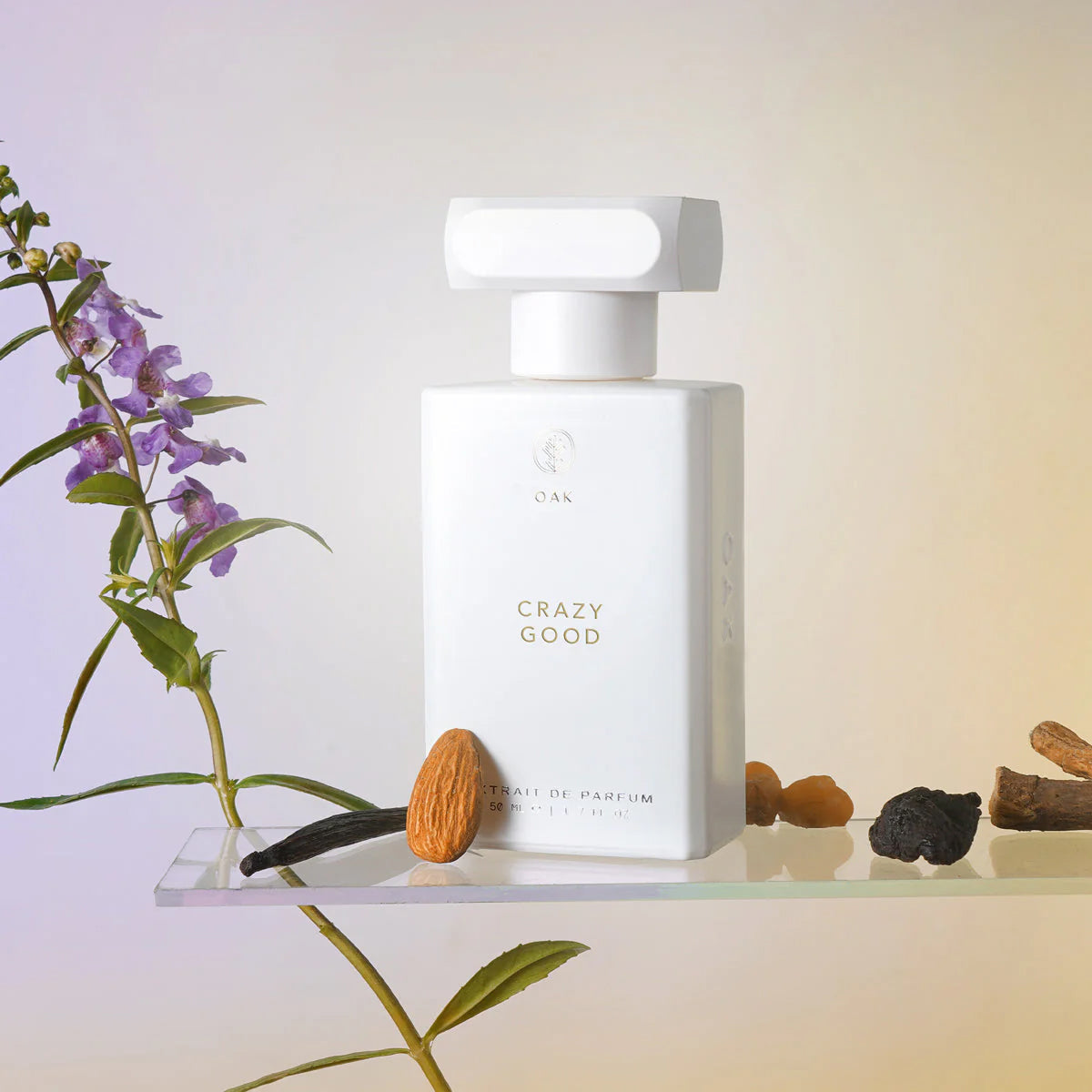 a bottle of body lotion sitting on a shelf next to a flower