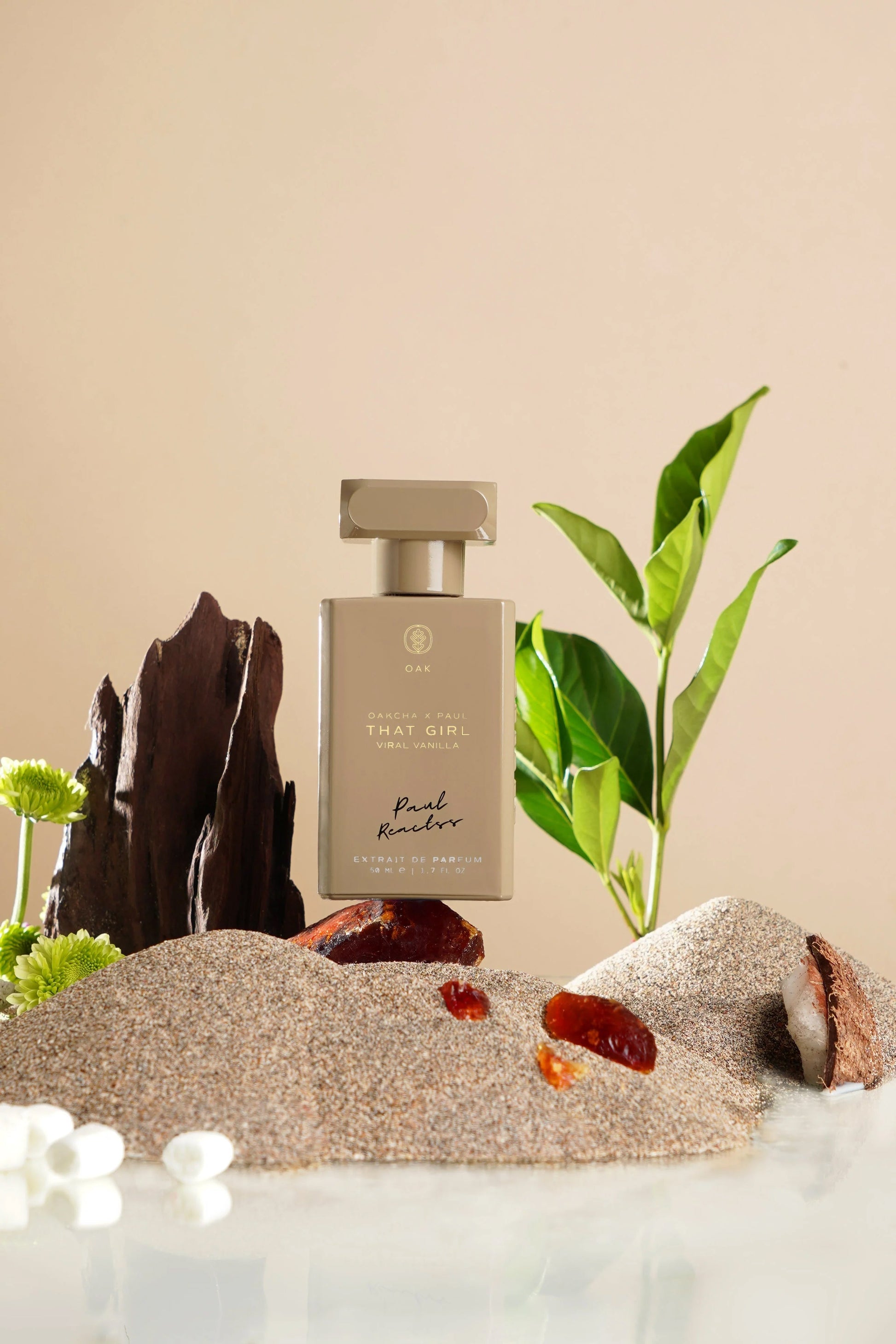 a bottle of perfume sitting on top of a table