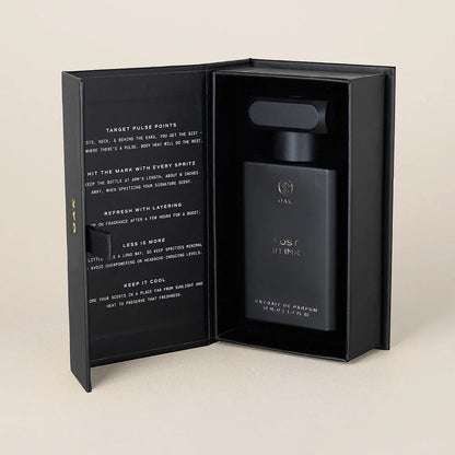 a bottle of perfume in a black box